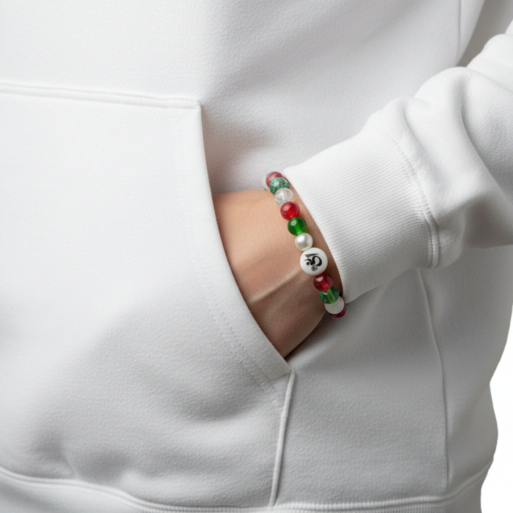 Multicolored beaded bracelet with a central white bead featuring an Om symbol on a light gray background.